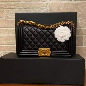 ❤SOLD❤Chanel le boy old medium black caviar GHW